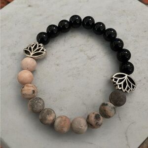Black and Zebra Pink Beaded Bracelet with Silver Lotus Accents